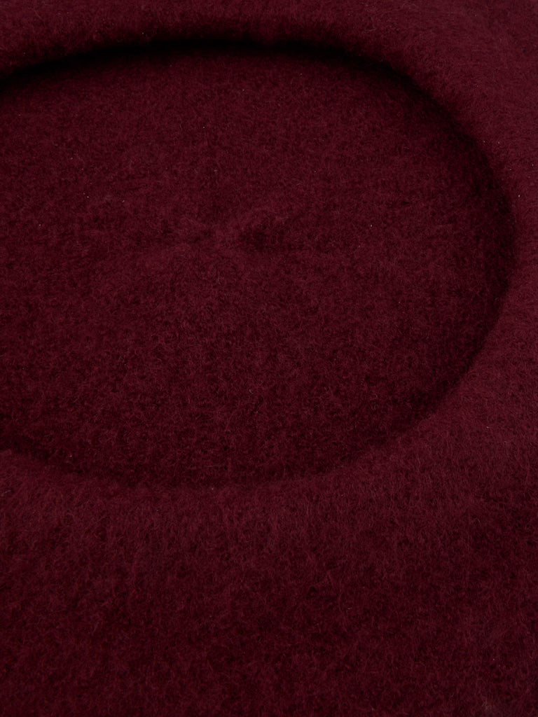 Dark red wool beret hat
