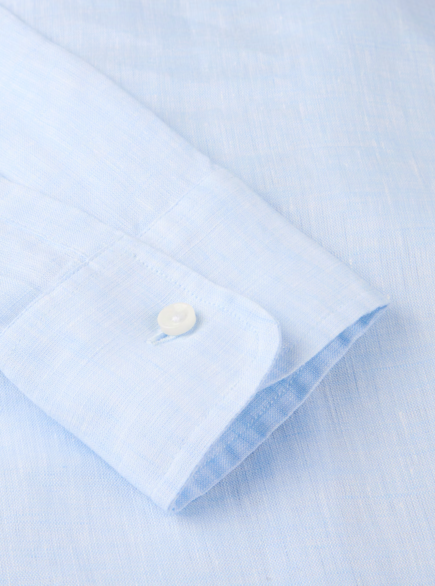 Hillary ljusblå linneskjorta med krusiduller