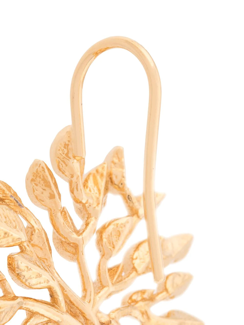 Trädsläppta örhängen, Mässing